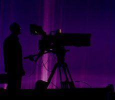 person standing near studio camera